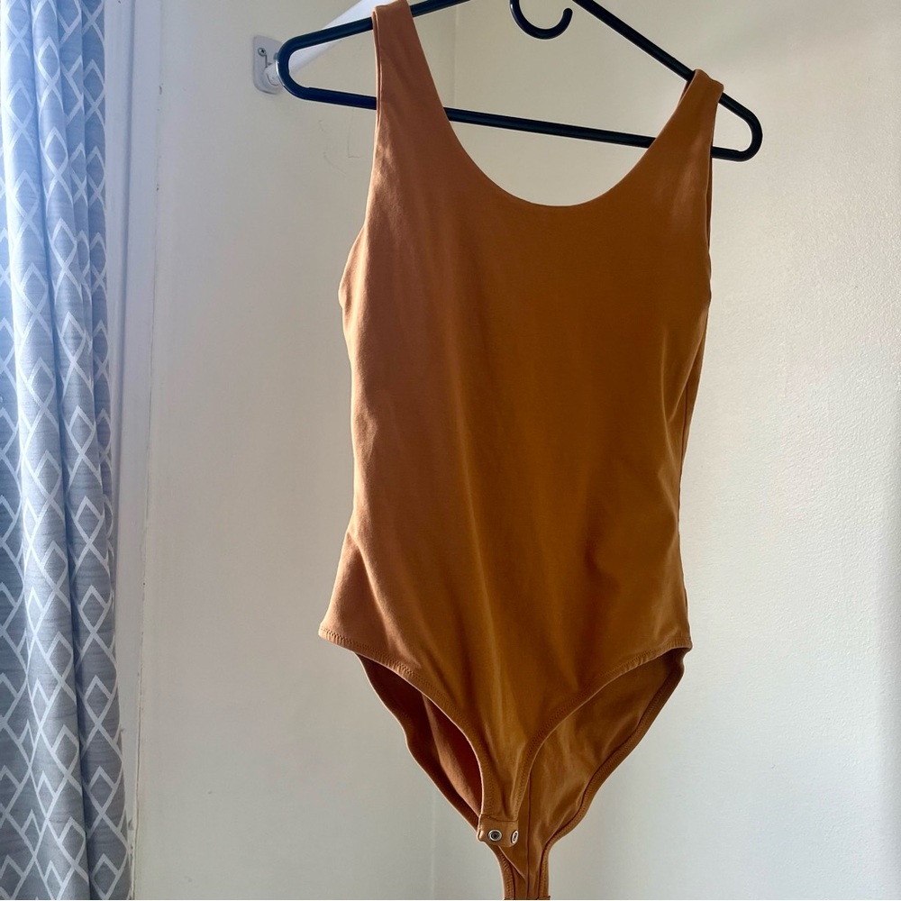 Pact umber brown/orange bodysuit